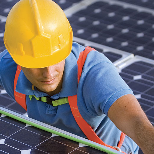 Man measuring solar panels