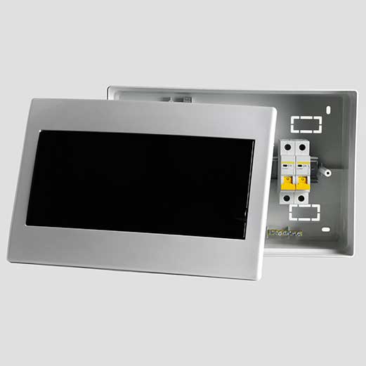 Plastic distribution board. Electrical board. Close-up. Isolated on light gray background.
