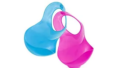 A blue and a pink flexible baby bib are linked together at the neck on a white background.