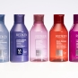 Redken shampoo bottles